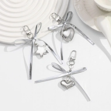 Móc khóa da bạc thời trang nơ trái tim Bowknot Charm Pendan giá ưu đãi 36.058 VND 6