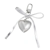 Móc khóa da bạc thời trang nơ trái tim Bowknot Charm Pendan giá ưu đãi 36.058 VND 10