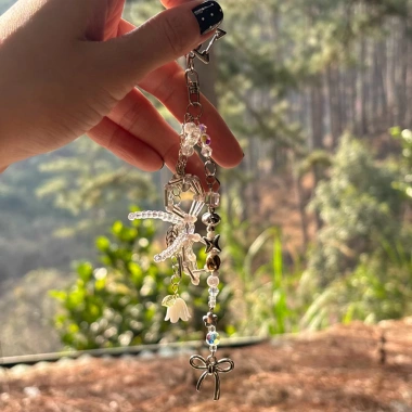 Móc khóa đeo túi Starry Bloom Charm – Lấp lánh, giá 65.000đ, giảm 17.550đ 6