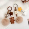 Móc khóa gấu nâu lông tơ fuzzy pom-pom - Đáng yêu, sang trọng, ô tô, giảm giá 53.810 VND 3