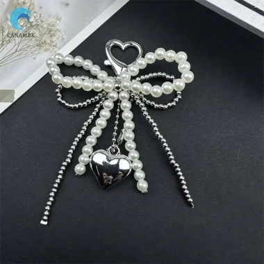 Móc khóa hình nơ ngọc trai handmade, gắn túi xách thời trang, giá chỉ 45.000 VNĐ 4