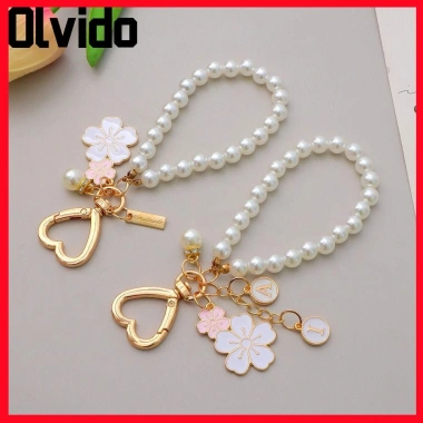 Móc khóa hoa anh đào OLVIDO, dây chuyền cườm ngọc trai mặt chữ - phụ kiện túi tai nghe sang trọng, giá ưu đãi 42.120₫