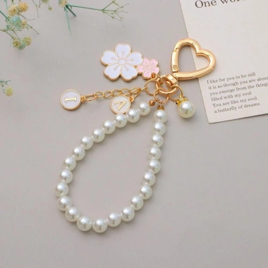 Móc khóa hoa anh đào OLVIDO, dây chuyền cườm ngọc trai mặt chữ - phụ kiện túi tai nghe sang trọng, giá ưu đãi 42.120₫