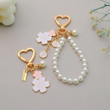 Móc khóa hoa anh đào OLVIDO, dây chuyền cườm ngọc trai mặt chữ - phụ kiện túi tai nghe sang trọng, giá ưu đãi 42.120₫