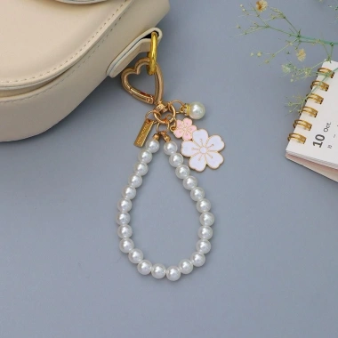 Móc khóa hoa anh đào OLVIDO, dây chuyền cườm ngọc trai mặt chữ - phụ kiện túi tai nghe sang trọng, giá ưu đãi 42.120₫