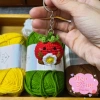 Móc khóa len hình quả cà chua ôm bông hoa cute phong cách trẻ trung - Giá chỉ 29.000đ, giảm mạnh so với 35.960đ 8