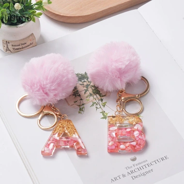 Móc khóa Luimo hồng pompom lông tơ 26 chữ cái, túi xách, quà tặng SBS 25.095₫ 4