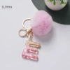 Móc khóa Luimo hồng pompom lông tơ 26 chữ cái, túi xách, quà tặng SBS 25.095₫ 10