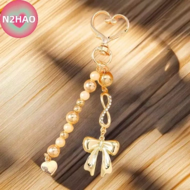 N2HAO Nơ Móc Khóa Hạt Ngôi Sao Trái Tim - Charm Túi, Mặt Dây Chuyền Phụ Kiện Quà Tặng Giảm Giá Đặc Biệt Độc Đáo 66.660₫