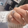Nhẫn Nữ Bạc Ý đá Moissanite 6.5mm Freesize kiểu Halo Linh Lan tặng hộp 562.000₫ 6