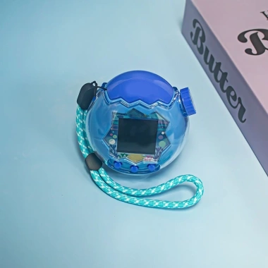 OLVIDO Vỏ cứng trong suốt PC pha lê chống bụi, trầy xước, có dây buộc cho Tamagotchi Paradise – Giá 135.300₫