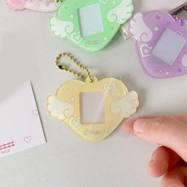 Photocard Giá đỡ Cánh trái tim có móc khóa - Khung dây chuyền 51.864₫