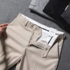 Quần âu nam slimfit cạp chun, túi chéo, logo thêu lịch lãm - giá chỉ 649k 8
