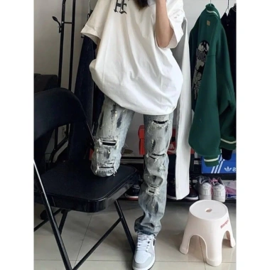 Quần jean retro Mỹ, đường phố - Jeans rách họa tiết mực, giảm còn 190k