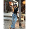 Quần jeans nữ ống rộng cạp cao màu xanh nhạt, dễ mặc, có thắt lưng – giá chỉ 410.000₫