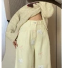 Quần jeans thêu nơ gấu nữ đầu xuân màu kem vàng - ống rộng, phong cách ngọt ngào, giảm tuổi, giá ưu đãi 321k 5