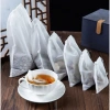 Set 100 túi lọc trà vải không dệt có dây rút đa kích thước, giá chỉ 17.000₫