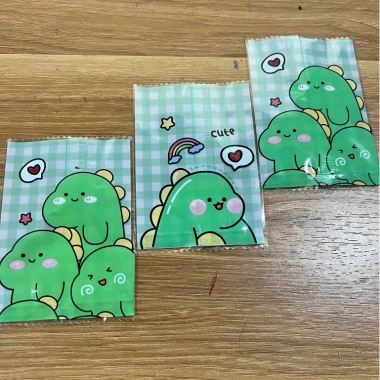 Set 100 túi nilon KHỦNG LONG, bao bì đựng bánh kẹo, trà hoa - Giá 17.000đ