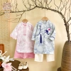 Set áo dài bé Diên Niên, quần dài nhung chéo Be Sáng ống đứng COCANDY Q4.411 – 189.000₫