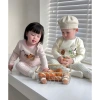 Set dài tay thu đông bé họa tiết siêu dễ thương, phối quần caro, size 7‑25kg Giá ưu đãi 136,300₫ 2