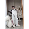 Set đồ thể thao nữ nỉ dày áo khoác zip sọc đỏ xanh rộng quần dài - Giá 289.000₫ 2