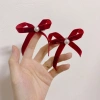 Set kẹp nơ nhung đỏ đính ngọc tiểu thư, 5 mẫu cho bé chơi Tết, giá 20.000đ 9