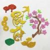 Set trang trí Tết chữ xốp kim tuyến, dây xu đào rời hồng, phụ kiện bánh chưng, lồng đèn, én, thỏi vàng – giá 18.450₫ 8