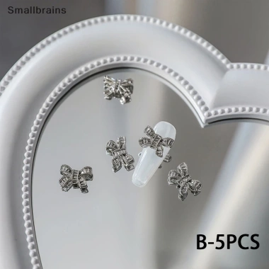 Smbr 5 móng tay ch nơ nút kim loại 3D – Bạc, kim cương giả, phụ kiện salon BR giảm giá 10 Smbr 5 móng tay ch nơ nút kim loại 3D – Bạc, kim cương giả, phụ kiện salon BR giảm giá 10