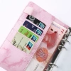 Sổ ghi chú A6 Lập kế hoạch - PU vân, khóa nam châm, 6 còng, 12 túi zip, 99.000₫ 4
