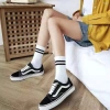 Tất Cổ Cao Nữ Hàn Quốc Trắng Trơn & Vớ Đen Kẻ Trắng TA31 - Giá 12.000 VND, bám chân chắc 5