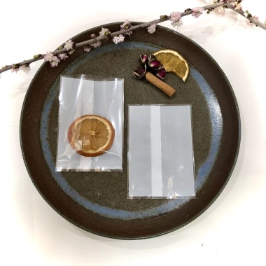Túi 7x10 cm đựng trà bánh kẹo 1 mặt trắng - 1 mặt trong, combo 100 túi bóng hàn miệng, giá chỉ 18.000₫
