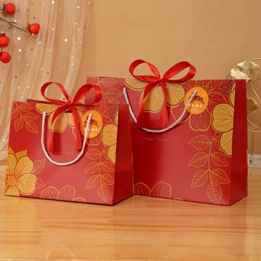 Túi giấy DANY Tết hoa mai có nơ, ruy băng sang trọng, chất liệu dày dặn - chỉ 20.000 VND