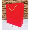 Túi giấy đựng quà tặng màu đỏ trơn – giấy dày cứng cáp, quai xỏ – Túi quà Tết 10