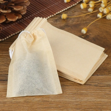 Túi lọc trà cà phê 100 túi giấy màu gỗ - lọc sạch, dây buộc tiện lợi | HVL TEA 9
