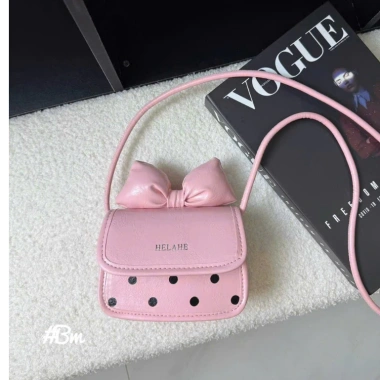 Túi mini bé gái nơ dễ thương 14cm họa tiết da chấm bi - Quà Tết ưu đãi 89.000đ
