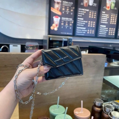 Túi mini đeo chéo thêu chỉ chéo nắp vát logo sắt bạc - Giá chỉ 79.000đ, giảm 20%