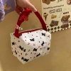 Túi mỹ phẩm cầm tay in nơ anh đào đen – Dễ thương, dung tích cao, quà tặng MỚI