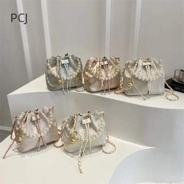 Túi xách đeo vai ngọc trai sang trọng phong cách Trung Hoa nữ - Ưu đãi 125k 6 Túi xách đeo vai ngọc trai sang trọng phong cách Trung Hoa nữ - Ưu đãi 125k 6