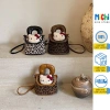 Túi xách mini Hello Kitty đeo chéo cho bé, hoạ tiết da beo - Giá ưu đãi 185.000₫
