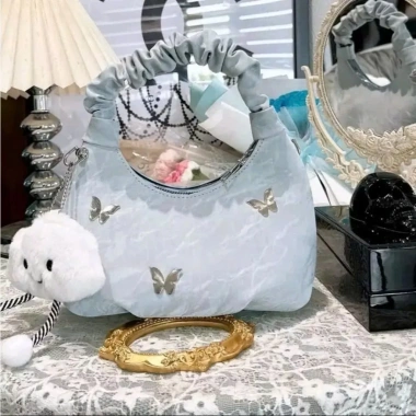 Túi xách nhúm da nhung chấm mây đeo chéo cầm tay dự tiệc Tết, giá 62.000₫