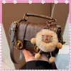 Túi xách nữ da nhăn 2 dải, đeo chéo tay, kèm móc gấu cute - ThanhThuTuiXach 959 - Giá 95k