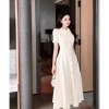 Váy kem dài cài nút thanh lịch cho công sở, xòe nhẹ tôn sang trọng, giá chỉ 378.000 VND 2