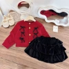 Váy len bé gái Set áo len đỏ nơ và chân váy nhung đen 3 tầng lót, Noel Tết 10-30kg Sữa Kids 209.000₫ 2