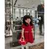 Váy polo hè Tini Kids cho bé gái màu đỏ, mềm mịn 8‑24kg, giảm còn 99.000đ 2