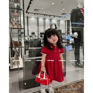 Váy polo hè Tini Kids cho bé gái màu đỏ, mềm mịn 8‑24kg, giảm còn 99.000đ