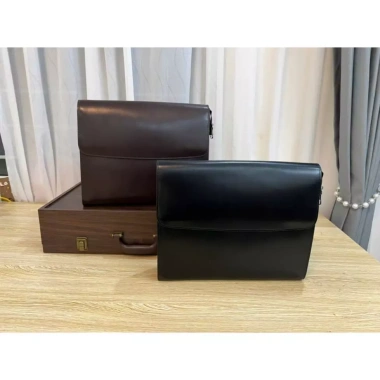 Ví cầm tay da bò thật, ngăn vừa khổ A4, giảm giá 28% chỉ 2.890.000₫