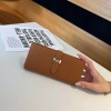 Ví dài nữ da thật chính hãng, dây kéo đa năng, đựng tiền thẻ lớn - 496,239₫