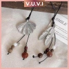 Vòng cổ lá bạc Ginkgo và lông vũ phong cách Trung Hoa Dễ phối đồ chụp ảnh đẹp, giá chỉ 21.500₫ 9