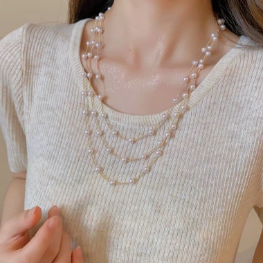 Vòng cổ ngọc trai nhiều lớp kiểu Pháp thanh lịch, phù hợp áo len, giá ưu đãi 37.620₫ 6 Vòng cổ ngọc trai nhiều lớp kiểu Pháp thanh lịch, phù hợp áo len, giá ưu đãi 37.620₫ 6