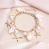 Vòng tay lắc tay sao biển ốc mix hạt, charm du lịch Bohemian phụ kiện chụp hình 7